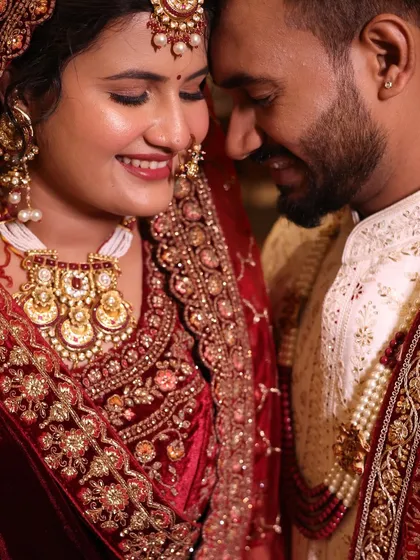 A beautiful, intimate moment between the bride and groom. Her makeup, with its soft glow and defined eyes, looks romantic and perfect up close.