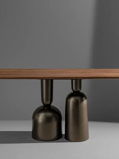 The bottle-leg console table shown with a solid wood top, offering a warmer, more organic alternative to the marble version.