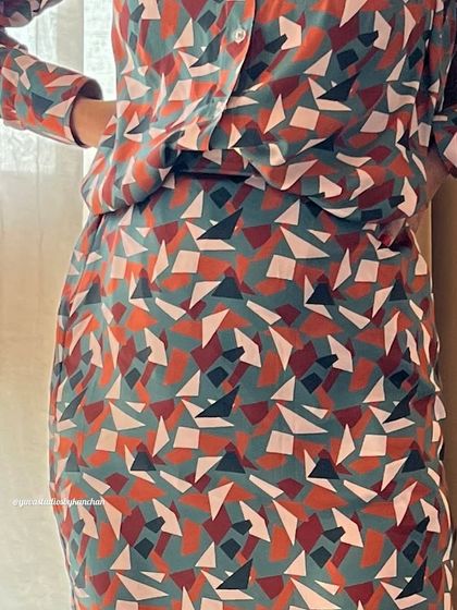 A closer look at the classy geometric print of our fine crepe co-ord set. This shirt and skirt combo is perfect for a sophisticated, modern look.