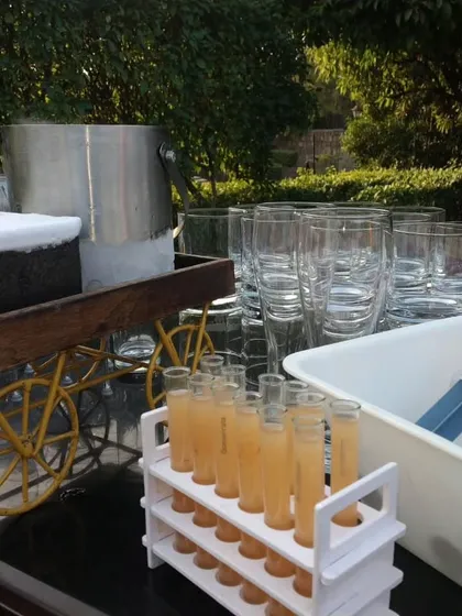 I enjoy bringing creative ideas to life, like serving welcome drinks in these test tubes. It's a unique and playful detail that always surprises guests and makes for a great conversation starter.