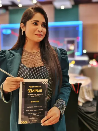 Holding the invitation for the Prime Technical seminar. It's all in the details, and I ensure every part of the event feels cohesive and well-managed.
