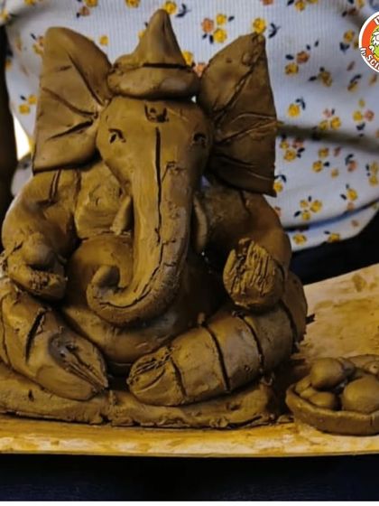 The details are everything! This young artist even sculpted a tiny plate of modaks for their Ganesha. Our workshops encourage kids to get creative and make their idol truly their own.