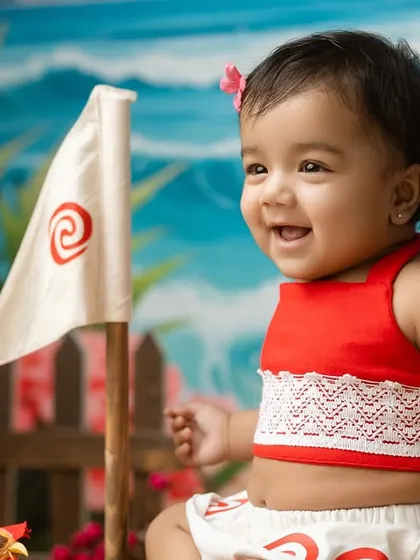 Another joyful shot of Moana, laughing as she embarks on her imaginary ocean journey.
