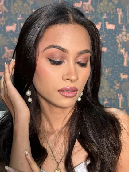 A close-up of the soft eyeshadow and sharp liner. The contrast creates a beautiful, eye-opening effect.