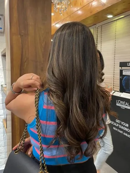 You don't always need bleach for a beautiful change. This rich balayage was achieved without any bleach, keeping the hair healthy while adding subtle, warm highlights.