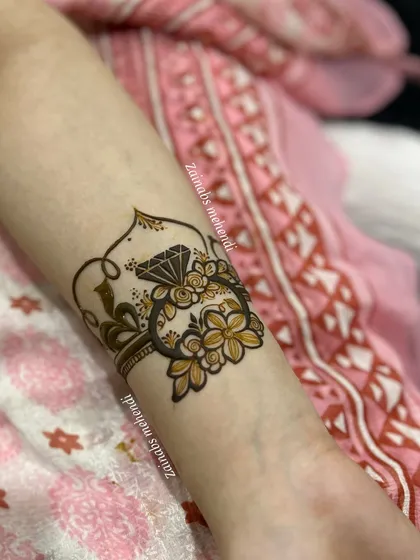 The complete armband design for Rida's engagement, featuring the diamond ring motif as the centerpiece.