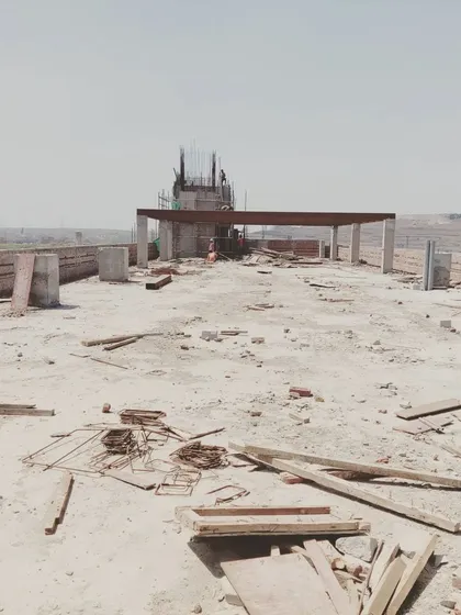 The terrace level of the Mathura Road commercial project, showing the initial framework for a rooftop structure.