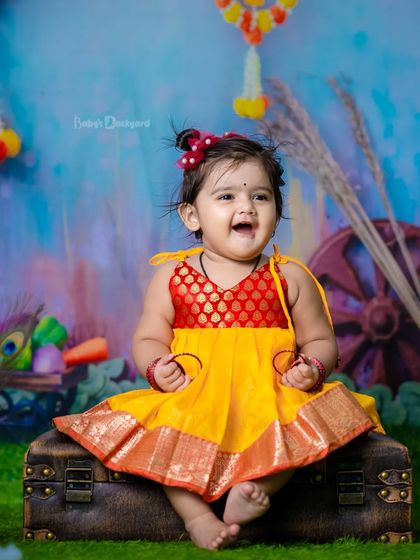 A little bit of heaven sent down to earth. This joyful smile lights up the entire studio.