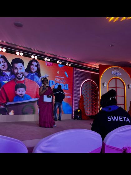 A view from the audience as our team member, Sweta, manages the show from the console for the 'Single Papa' launch.