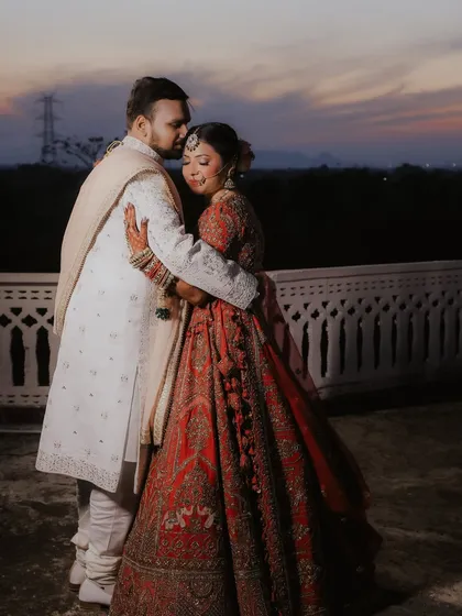 An embrace that says everything without a word. Samarth and Shreya at Umaid Palace, wrapped in the warmth of the sunset and their love for each other.