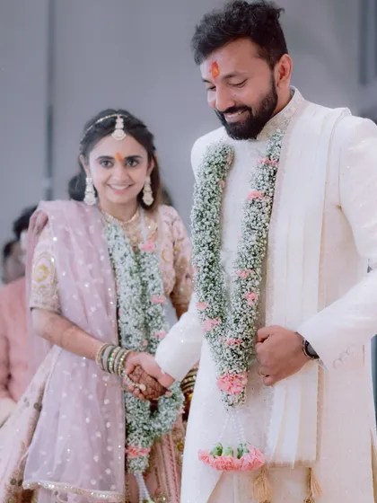 A gentle, reassuring hand-hold between the bride and groom during their ceremony. It's the small gestures of connection that we love to capture.