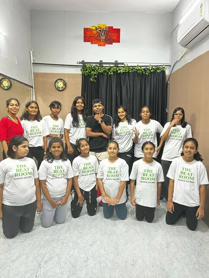 The full crew. A group photo of our students with their instructor, showcasing the large and happy family we have at The Beat Room.
