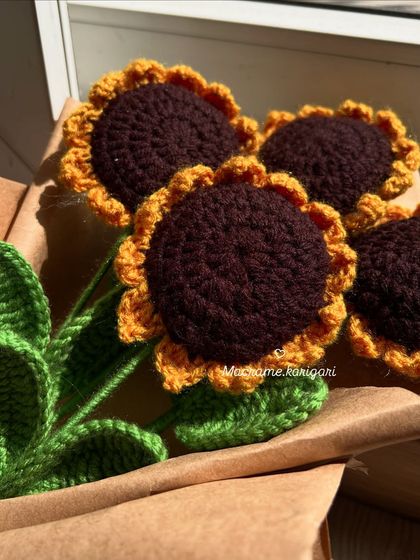 A close-up of the rich texture and deep brown centers of our crochet sunflowers. We pay close attention to every detail to make them as beautiful as possible.