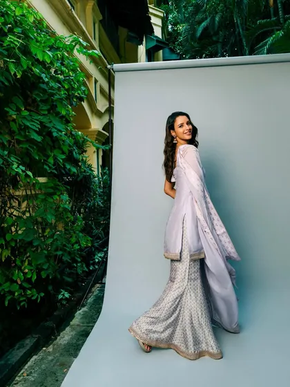 This gorgeous lilac sharara set from House of Masaba is light, breezy, and effortlessly chic. It’s a perfect rental for a daytime mehendi or a summer wedding event.