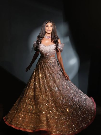 Farhana Bodi looking ethereal in a sparkling gown. Our hair and makeup services ensured she was ready for her moment in the spotlight.