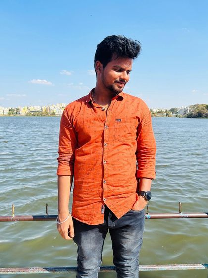 Enjoying the view across Madiwala Lake on a bright, sunny day.