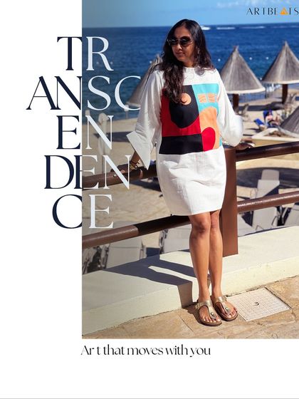 Art that moves with you. This image captures the essence of the Transcendence shift dress, a piece that allows you to carry a story of growth and change wherever you go.