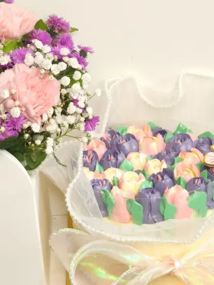 A closer look at one of my floral bouquet cakes. The piped tulips in pastel colors are so delicate and pretty, making it a perfect gift for Mother's Day or a birthday.