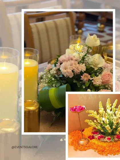 A close-up of the table centerpieces for the Anantha Vegworld event. The combination of candles and fresh flowers creates a warm and inviting atmosphere for guests.