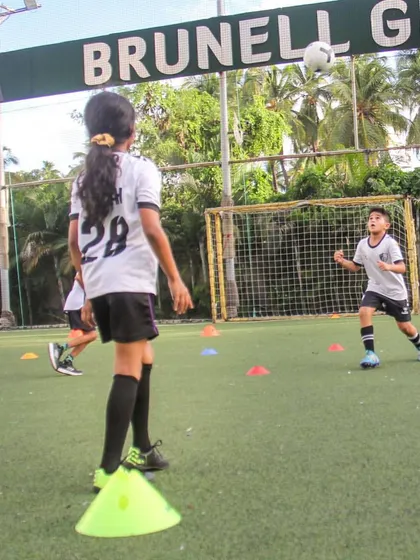 Players practice heading and controlling the ball in the air. These game-like drills help build friendships and an understanding of team dynamics on the field.