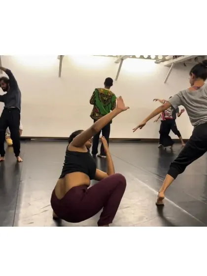 Participants exploring space and connection during a contemporary movement session. Our workshops are a safe space for individual expression and discovery.