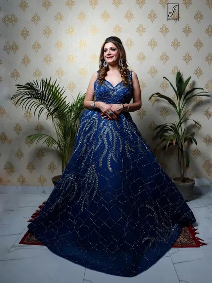 The full, grand sweep of the gown is displayed in this shot, perfect for showcasing the designer's craftsmanship.