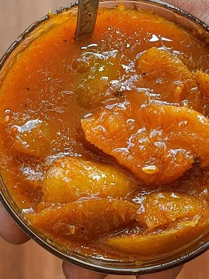 A spoonful of my tangy lemon pickle. It is soft, juicy, and has a wonderful khatta taste that goes perfectly with mathri or a simple meal of dal and rice.