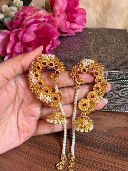 Another view of the floral karnful, showing the jhumka and pearl chain detail.