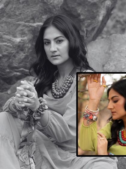 A detailed shot focusing on the accessories for the 'Boho Barren' look. We layered bohemian-style bracelets and necklaces to add texture and color, which was central to the shoot's aesthetic.