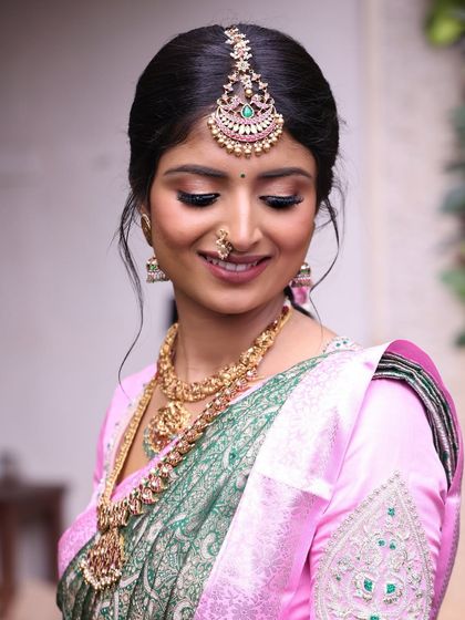 This close-up showcases the flawless eye makeup. A clean, sharp wing and soft, blended eyeshadow create a look that is both defined and romantic. The skin is glowing.