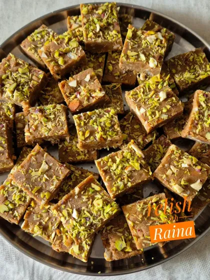 A platter of Adadiya Pak, ready to be served. The texture is dense and the flavor is rich and aromatic.