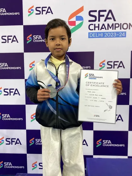 Kavya Negi, another young talent, with her silver medal from the SFA Championship in the U-9 category.