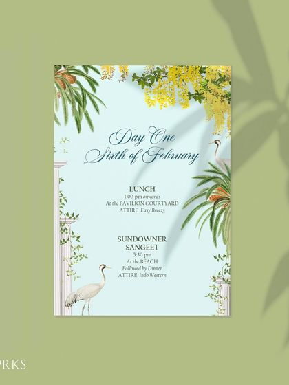 The digital itinerary for Day One of the Goa wedding. The soft blue background and illustrations of cranes and local flora provide guests with the schedule in a beautifully themed format.
