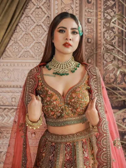 A bold and beautiful look for a Muslim bride. I used a classic red lip and defined eyes to create a heavy glam look that is both traditional and striking.