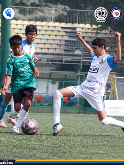 A celebratory slide after a successful play. We encourage our players to enjoy the game and play with heart.