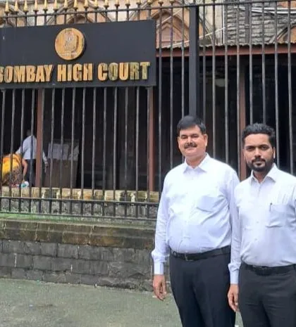 My practice is not limited to Delhi. Here, I am with a colleague at the Bombay High Court, showcasing my firm's capability to handle significant civil cases and property disputes in major legal jurisdictions across India.