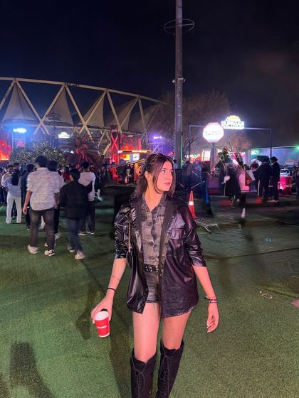 A full-length view of my concert fit, including the knee-high boots.