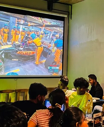 A close-up of the F1 action on our projector. We make sure you get the best view of every pit stop and overtake.