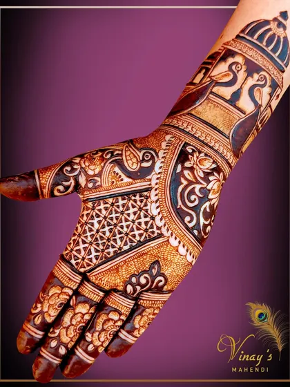 A beautiful design featuring peacocks and architectural elements, offering full coverage for the palm in a stylish way.