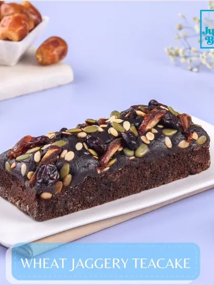 Our Wheat Jaggery Teacake is a healthier indulgence. It's naturally sweetened with jaggery and topped with a mix of nutritious seeds and dried fruits.