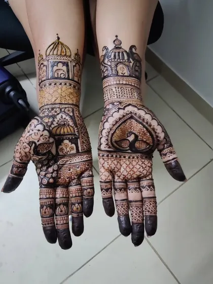 A slightly different angle of the architectural bridal mehendi, showing the symmetry and fine details.
