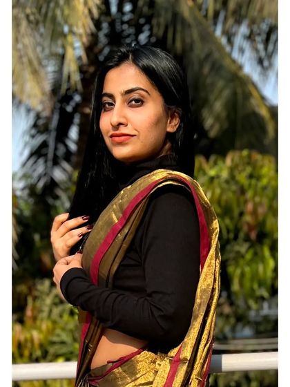 Launching 'Aarini', our Ugadi Edit. This tissue cotton saree in a unique copper-brown shade is styled here with a turtleneck, showing its versatility.