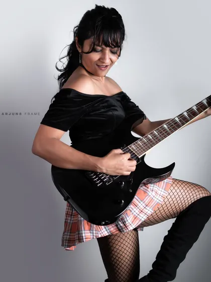 Channeling 90s grunge and glory. I love incorporating movement and props like this electric guitar to bring a dynamic, rebellious energy to fashion photography.