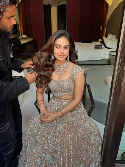 A behind the scenes look at creating flawless, voluminous waves for a bridal client. My hands-on training covers how to properly set the hair to achieve this kind of body and movement.
