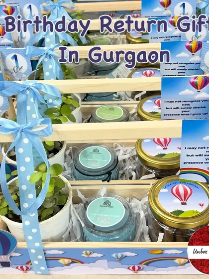 "Birthday Return Gifts in Gurgaon." This image showcases the 'Hot Air Balloon' favors, highlighting the custom tags and ribbons.