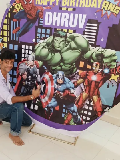 A quick pose with the nearly-finished Avengers backdrop. I take pride in every setup we create.