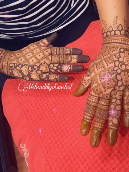A beautiful floral jaal pattern covering the entire hand, an elegant choice for festivals like Teej or Diwali.