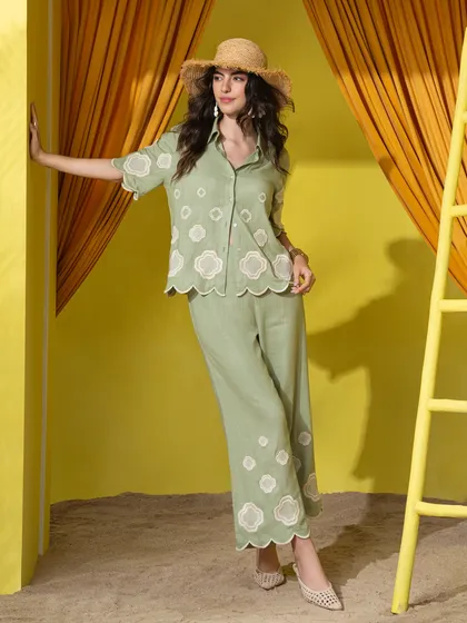 A solo model shot for Boho-Chic's summer collection, showcasing a coordinated set against our custom-built beach hut set.