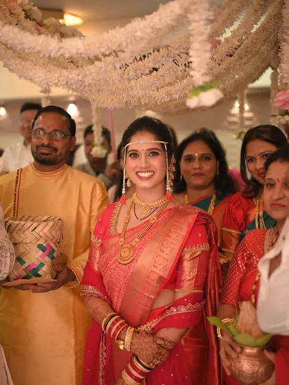 A beautiful, smiling portrait of the bride during her entrance, capturing her happiness.