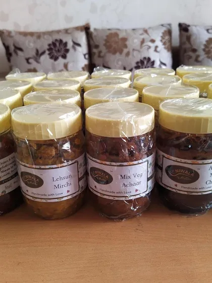 Getting these orders ready for shipping. Here you can see my Bharwa Mirchi, Lehsun Mirchi, Mix Veg Achaar, and Aam ki Mithi Chutney, all sealed and labelled.